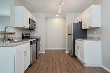 Vinyl flooring in kitchen and baths